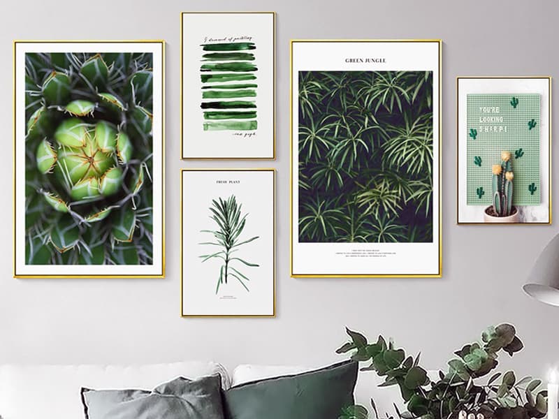 Використання картин в зелених тонах для оформлення дизайну кімнати