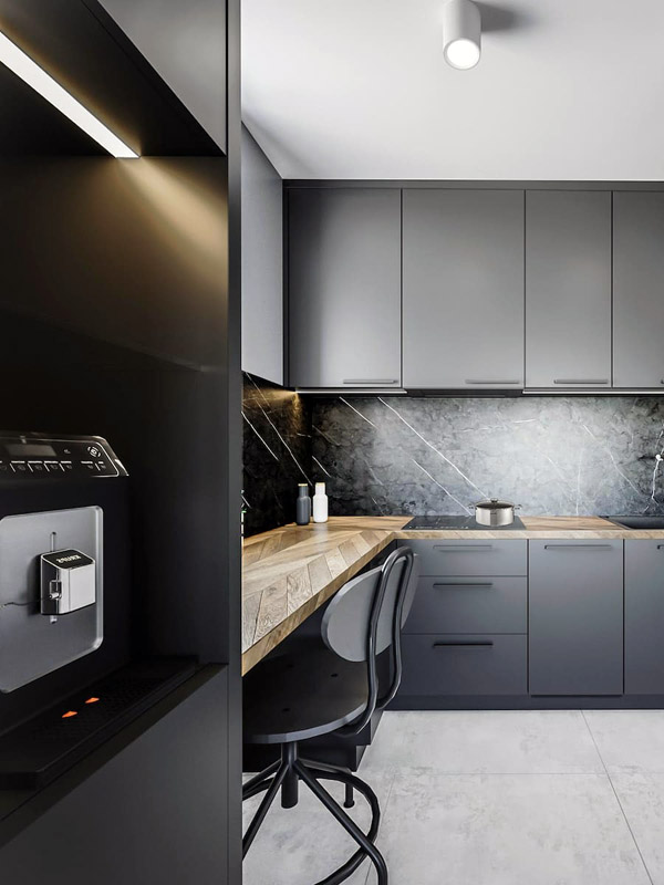 Приклад інтер'єру кухні з темними меблями