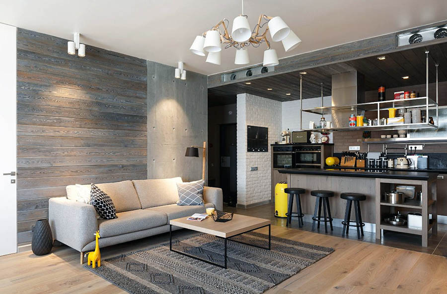 Велика вітальня з високими стелями з інтер'єром у стилі лофт