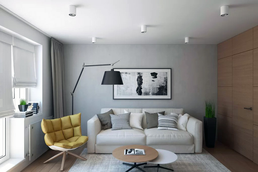 Світла простора вітальня з сучасним дизайном