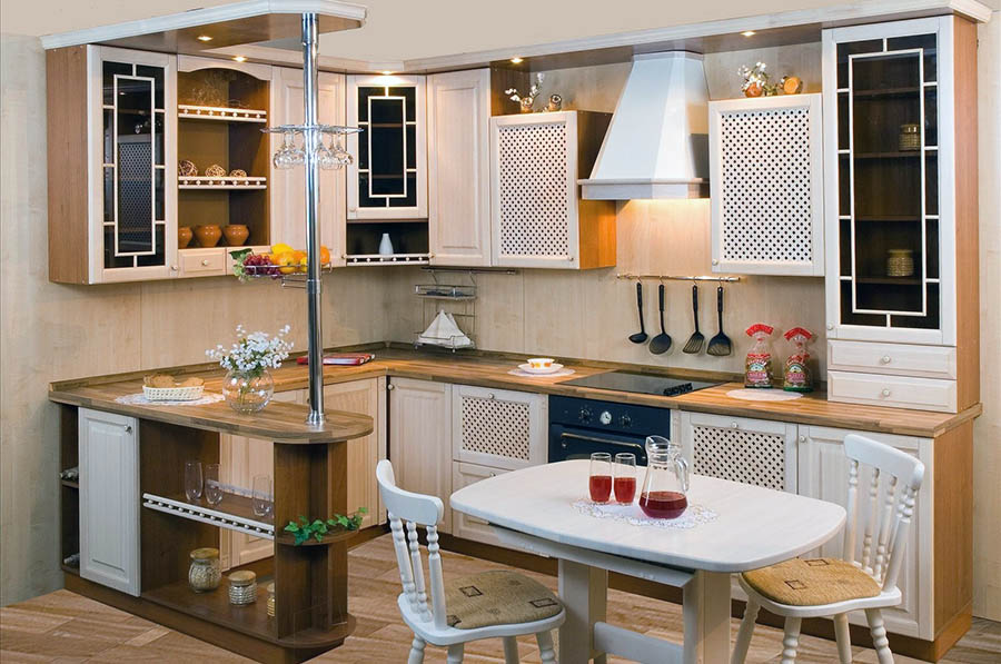 Удобная угловая барная стойка рядом с рабочей часть кухни