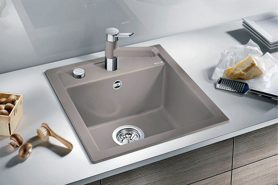 Кухонна мийка із штучного каменю