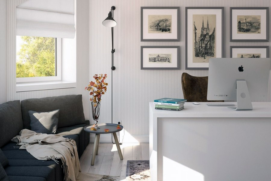 Зручний робочий кабінет на мансарді будинку