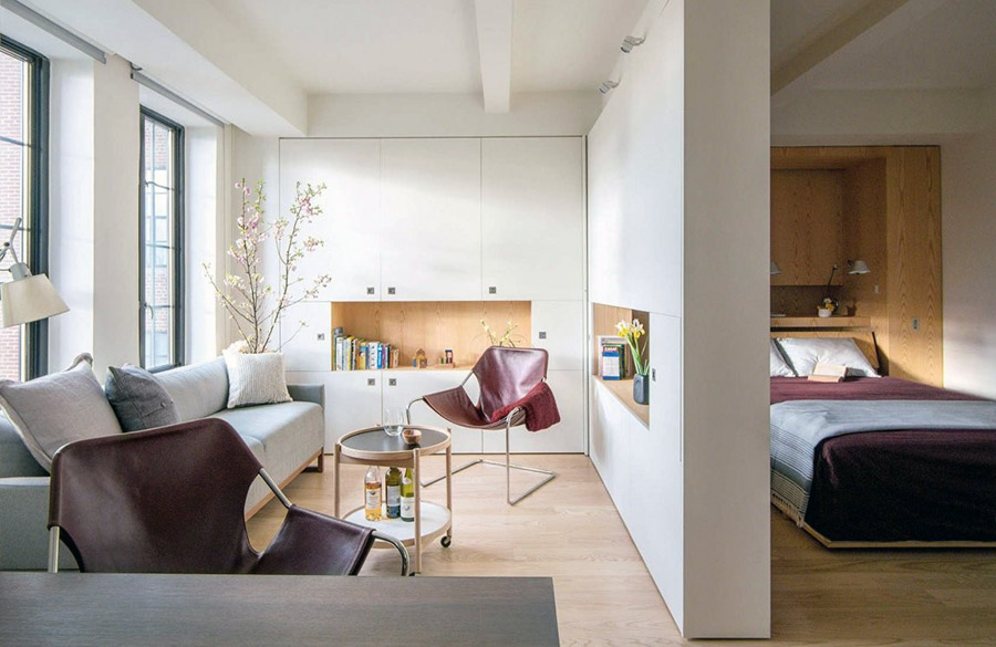 Зонирование пространства квартиры-студии при помощи искусственной стены