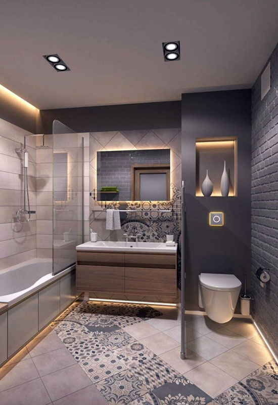 Ванна кімната з гарною системою освітлення над кожною зоною