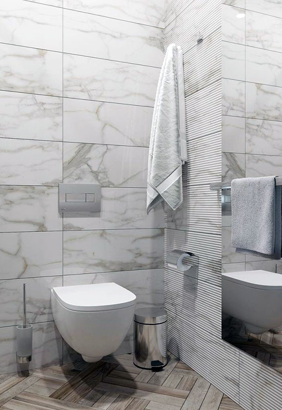 Отделка стен ванной комнаты крупной плиткой из керамогранита