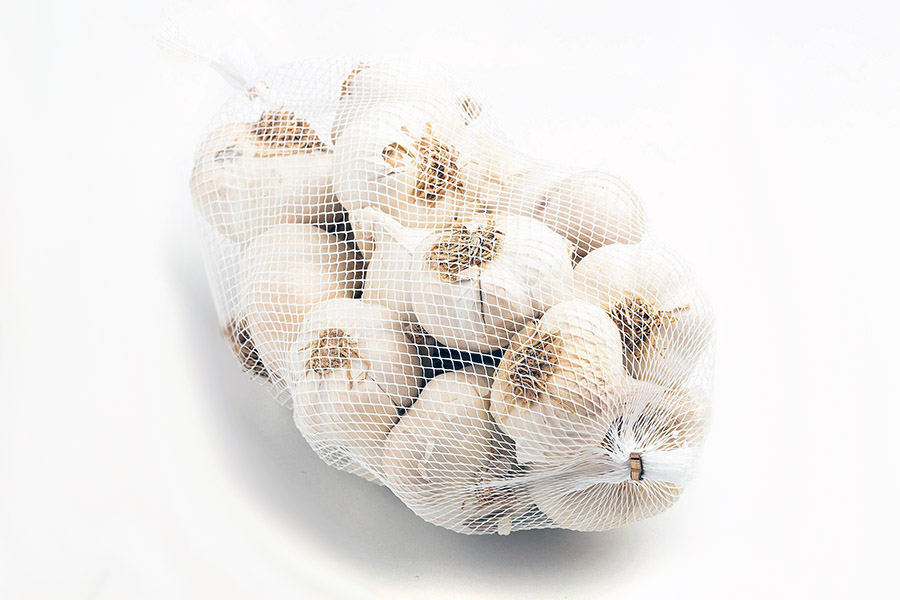 Як зберегти часник на зиму у сітці