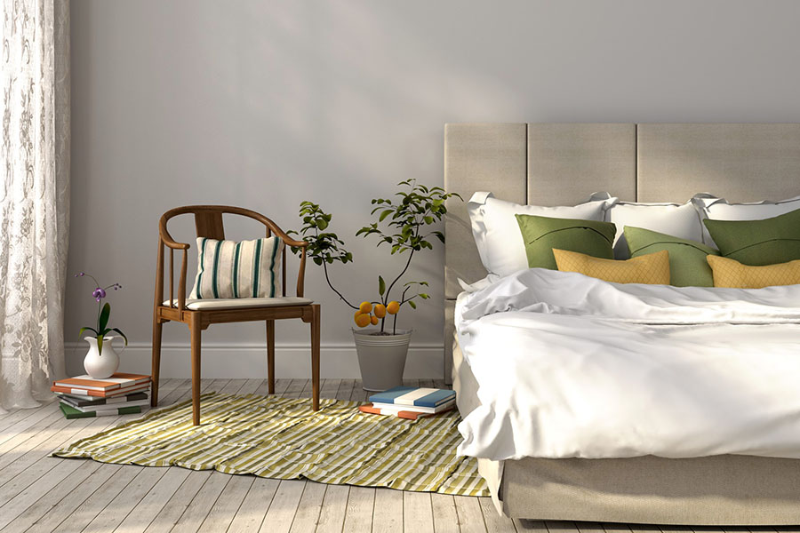 Приклад красивого приліжкового килимка в спальні