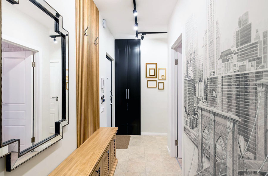 Як гармонійно поєднувати різні елементи декору та меблів у невеликому передпокої