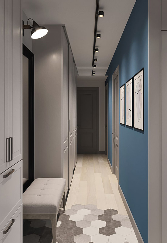 Яскравий сучасний дизайн вузького передпокою з правильним освітленням